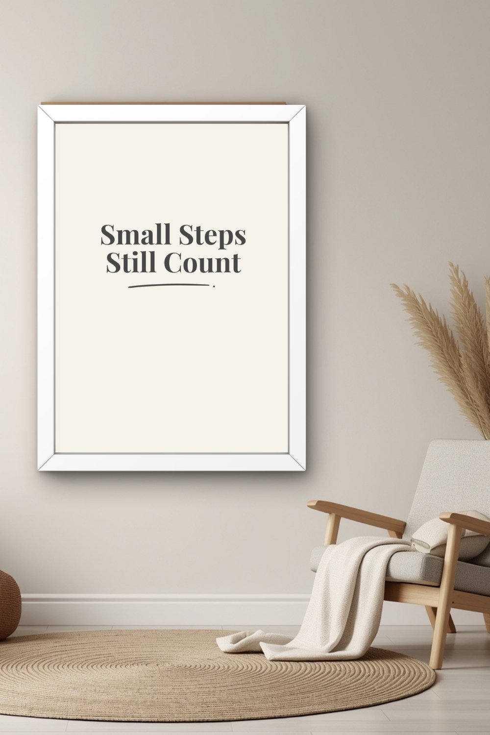 Minimalist affirmation wall art Small Steps Still Count in cozy neutral reading corner interior