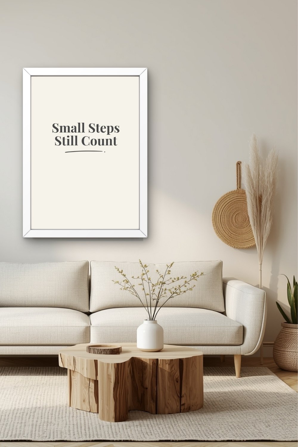 Small Steps Still Count affirmation wall art above sofa in calm minimalist living room decor