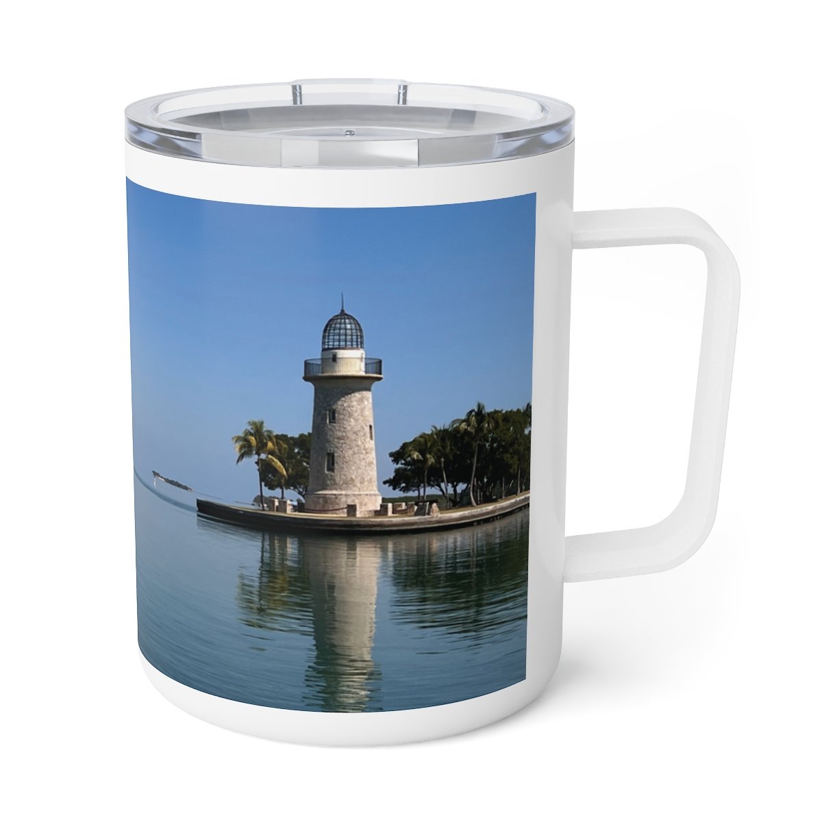 “Front view of insulated stainless steel mug featuring a warm Miami sunrise over the water.”