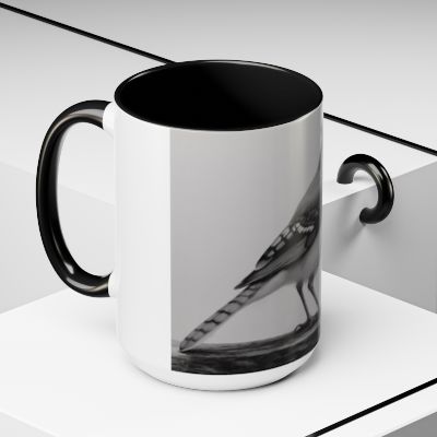 “Ceramic mug featuring serene blue jay artwork inspired by nature stillness.”
