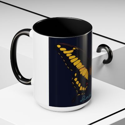 “Close‑up of swallowtail butterfly artwork on glossy ceramic mug.”