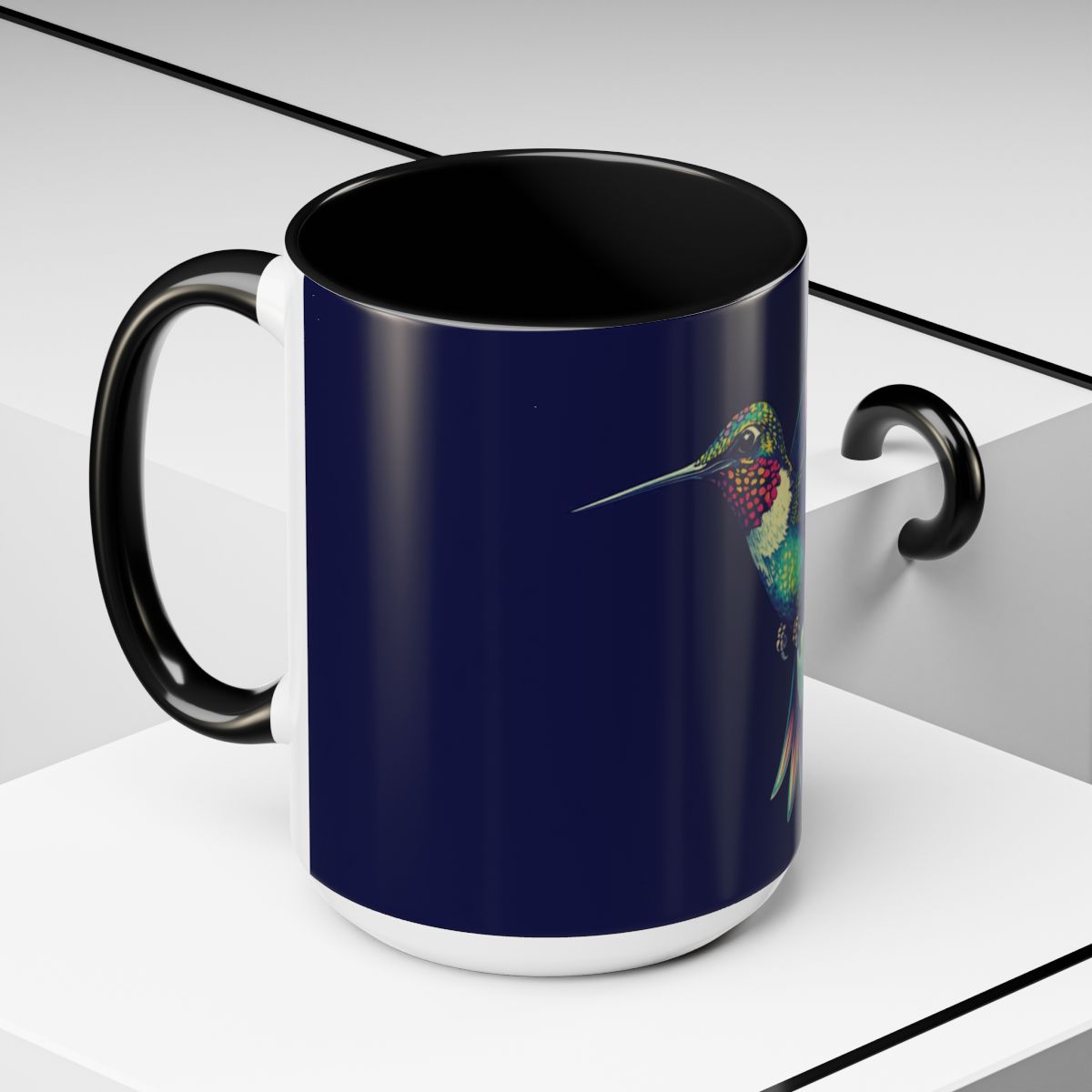 “Close‑up of detailed hummingbird artwork printed on glossy ceramic mug.”