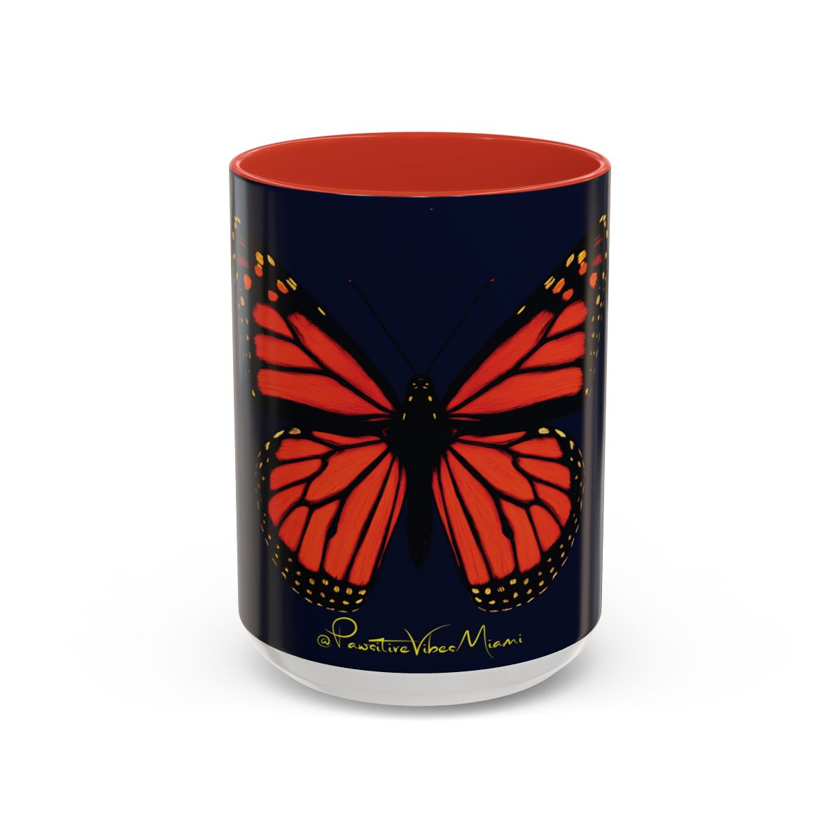 “Monarch butterfly design printed in vibrant orange and gold on ceramic mug.”