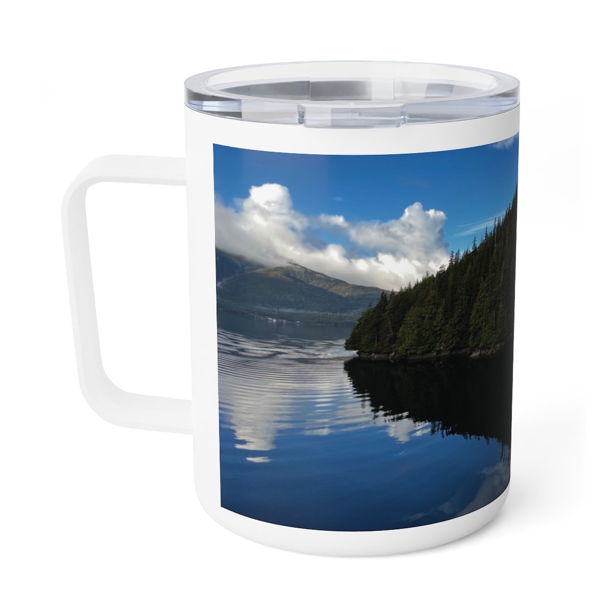 “Insulated mug featuring an Alaska island reflected in perfectly still water beneath glacier‑blue sky.”