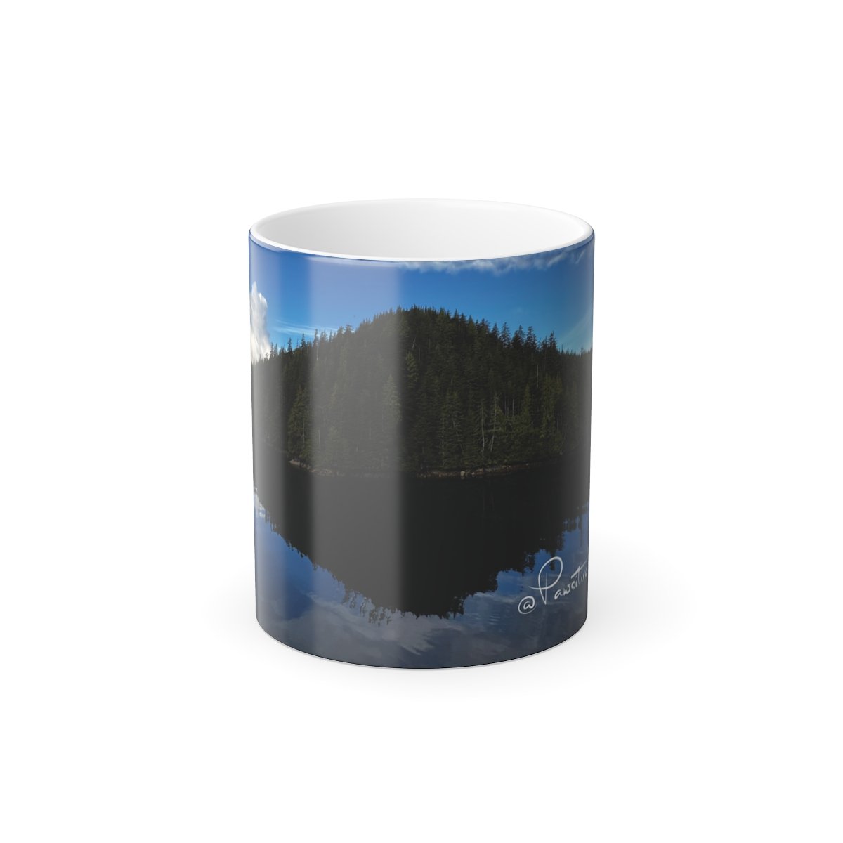“Heat‑reveal mug showing an Alaska island reflection emerging as the mug warms.”