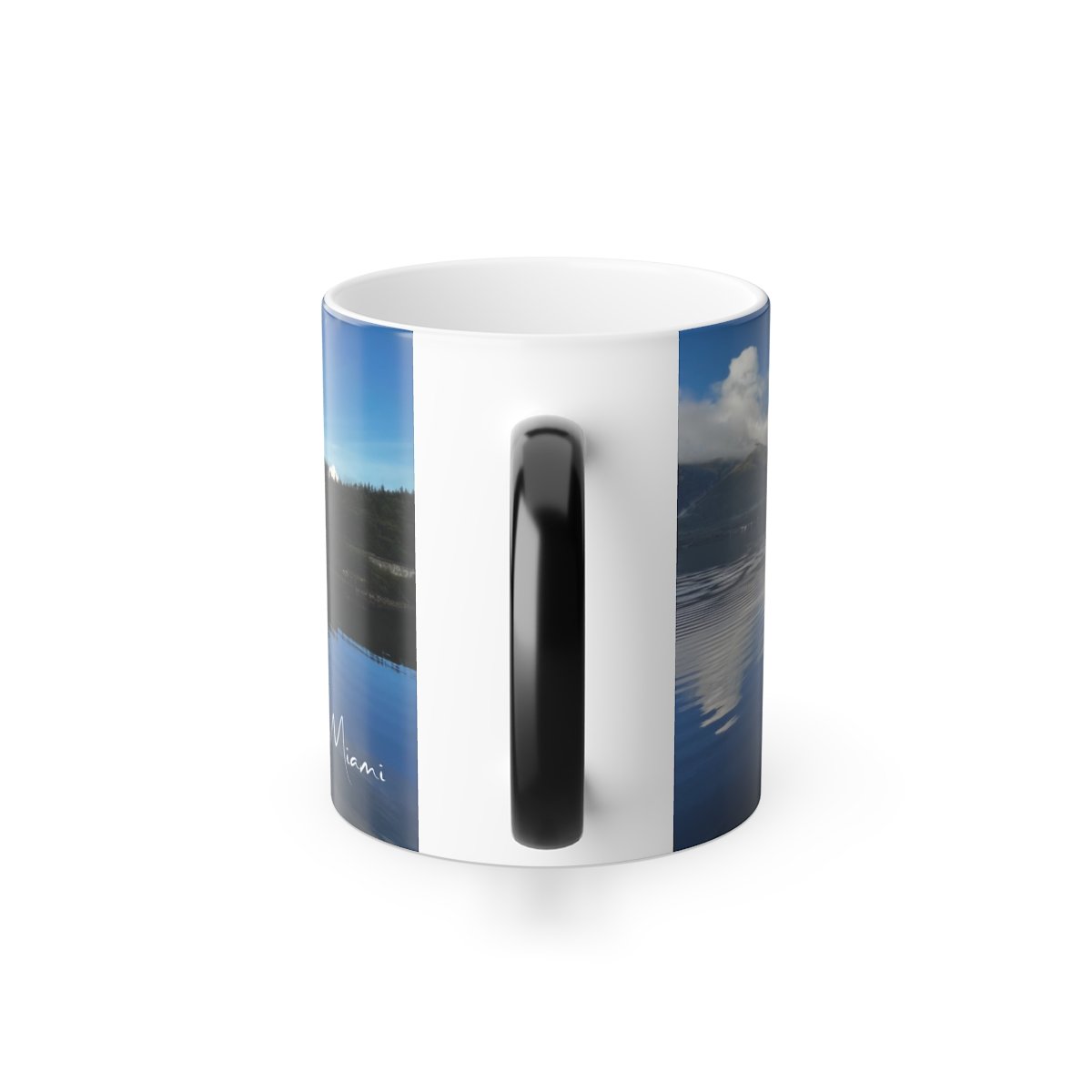 “Angled view of color‑changing mug featuring an Alaska island reflection revealed by heat.”