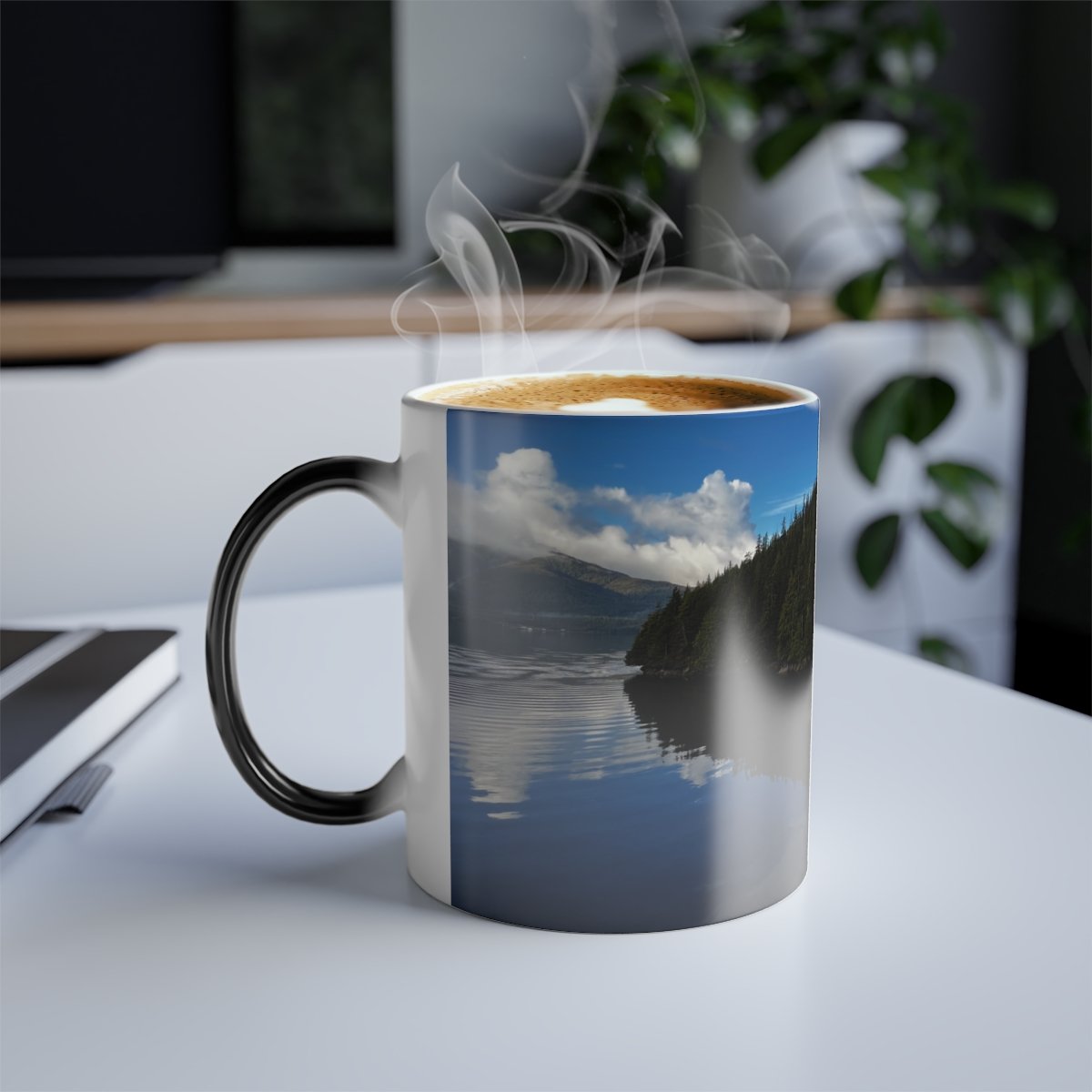 “Heat‑sensitive mug displaying a peaceful Alaska scene appearing through rising warmth.”