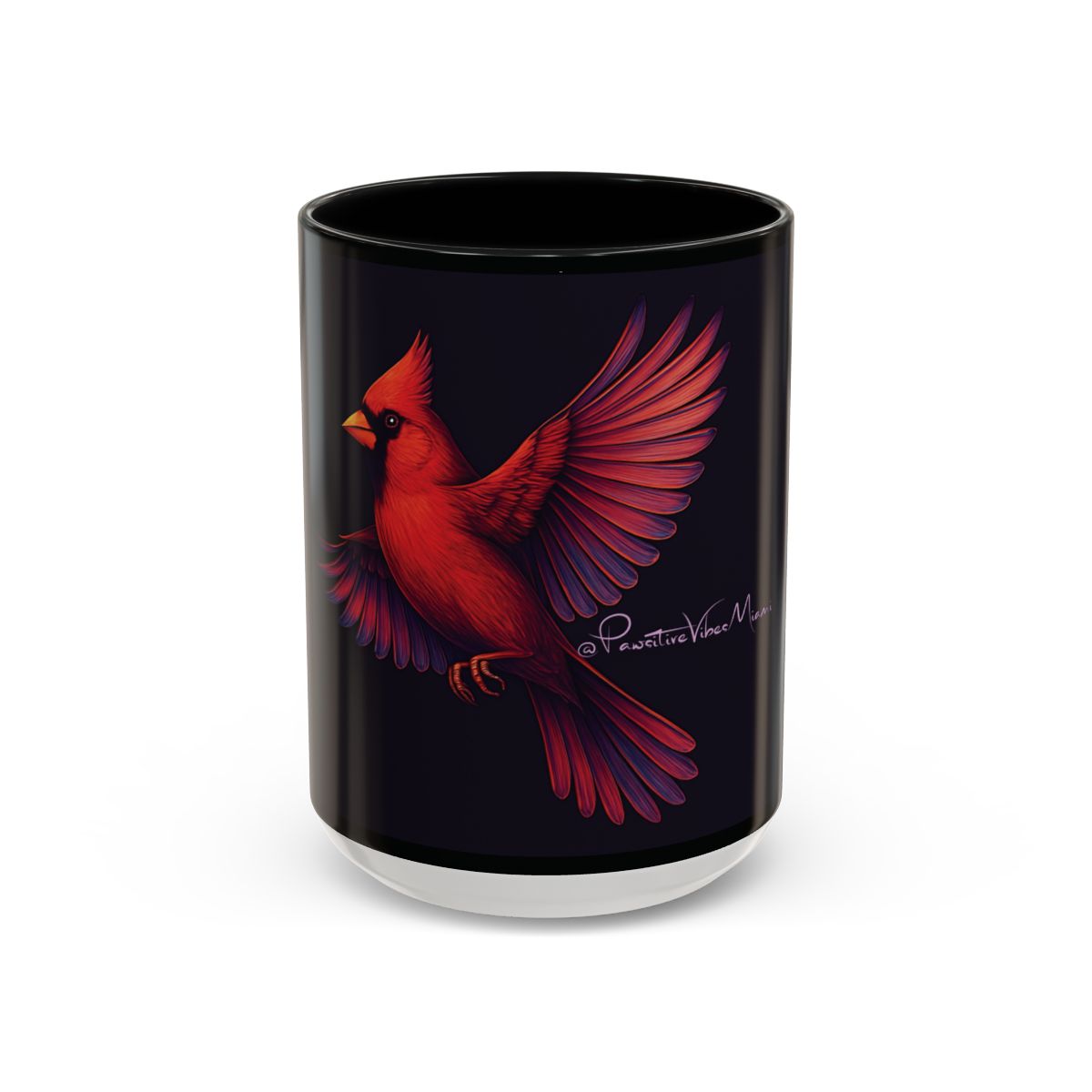 “Red cardinal with glowing wings printed on a black ceramic mug, symbolizing spiritual presence and remembrance.”