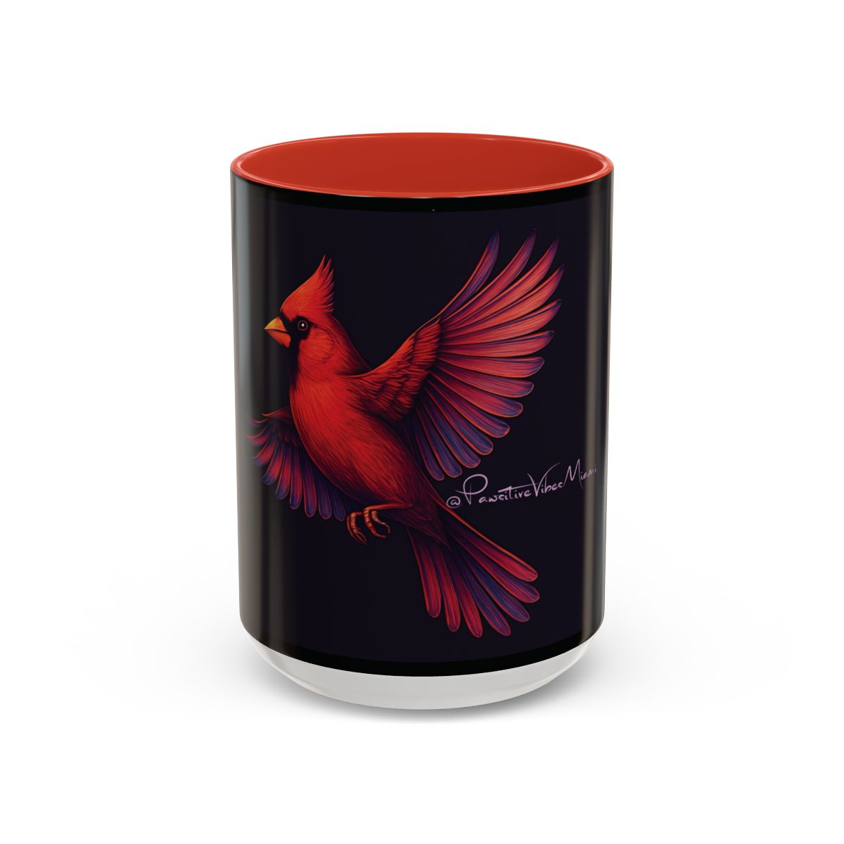 “Orange mug with luminous red cardinal design symbolizing warmth and spiritual presence.”