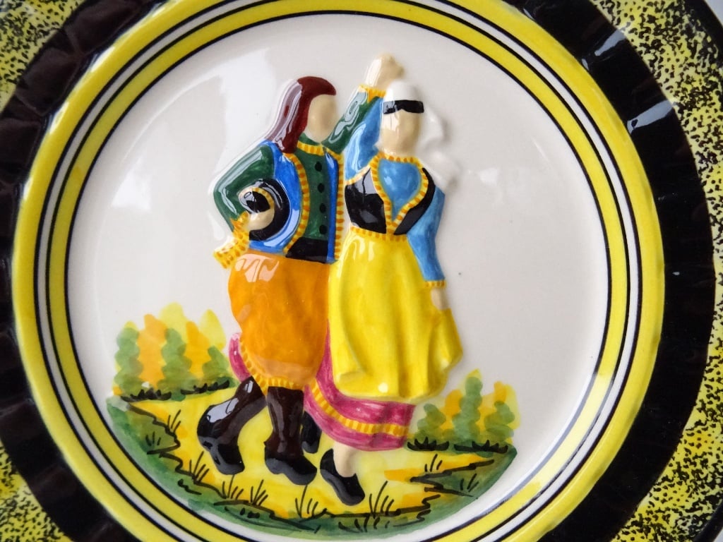 Henriot Quimper Plate featuring Breton Dancing Couple with raised decor
