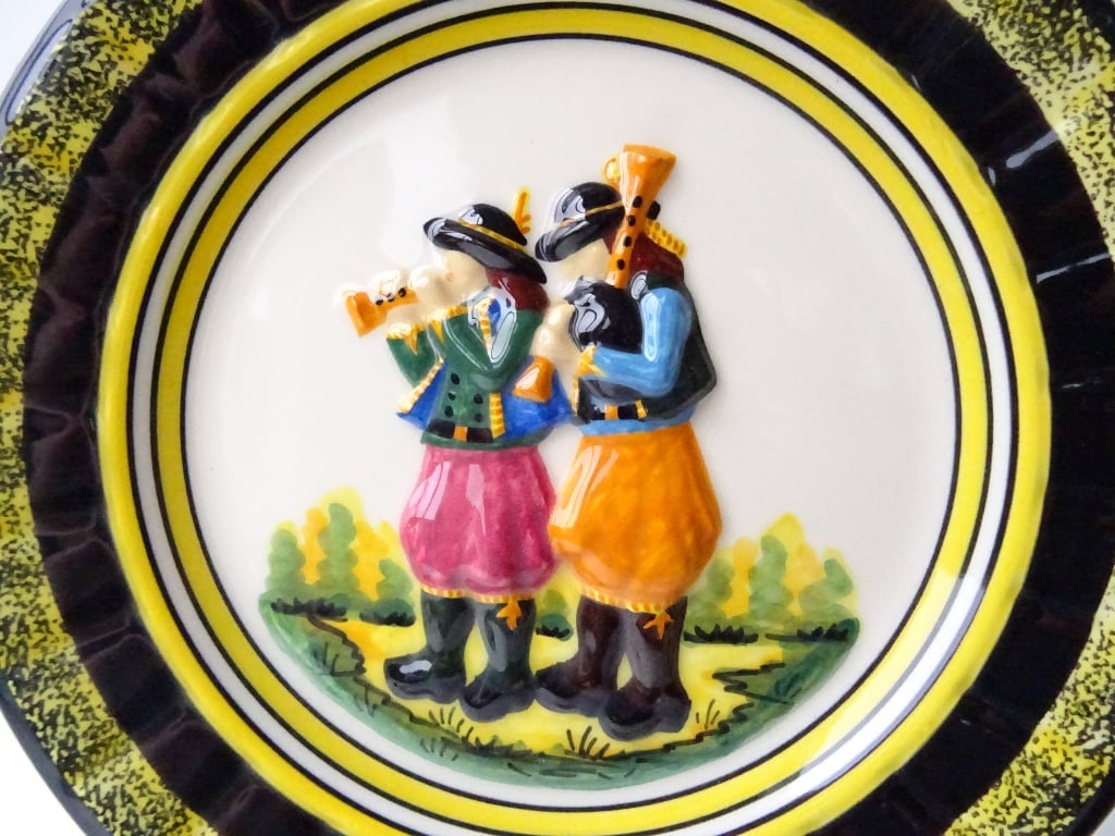 Henriot Quimper Plate featuring Bagpipe and Bombard players with raised decor