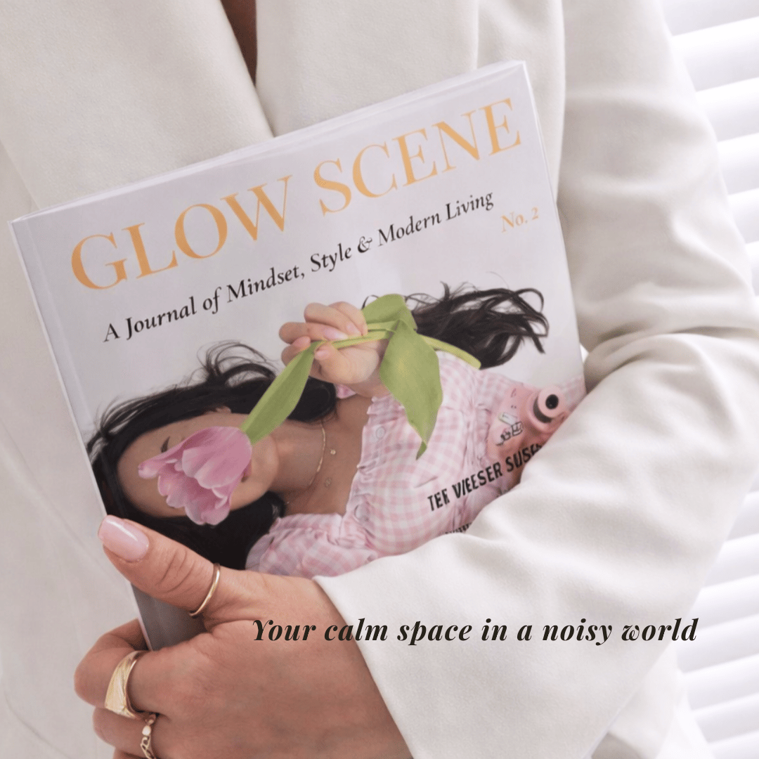 Glow Scene Issue 2 magazine cover held in a calm feminine setting with soft aesthetic, tulips and modern lifestyle inspiration.