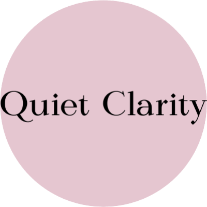 Pink circle with the words "Quiet Clarity" written on the inside.