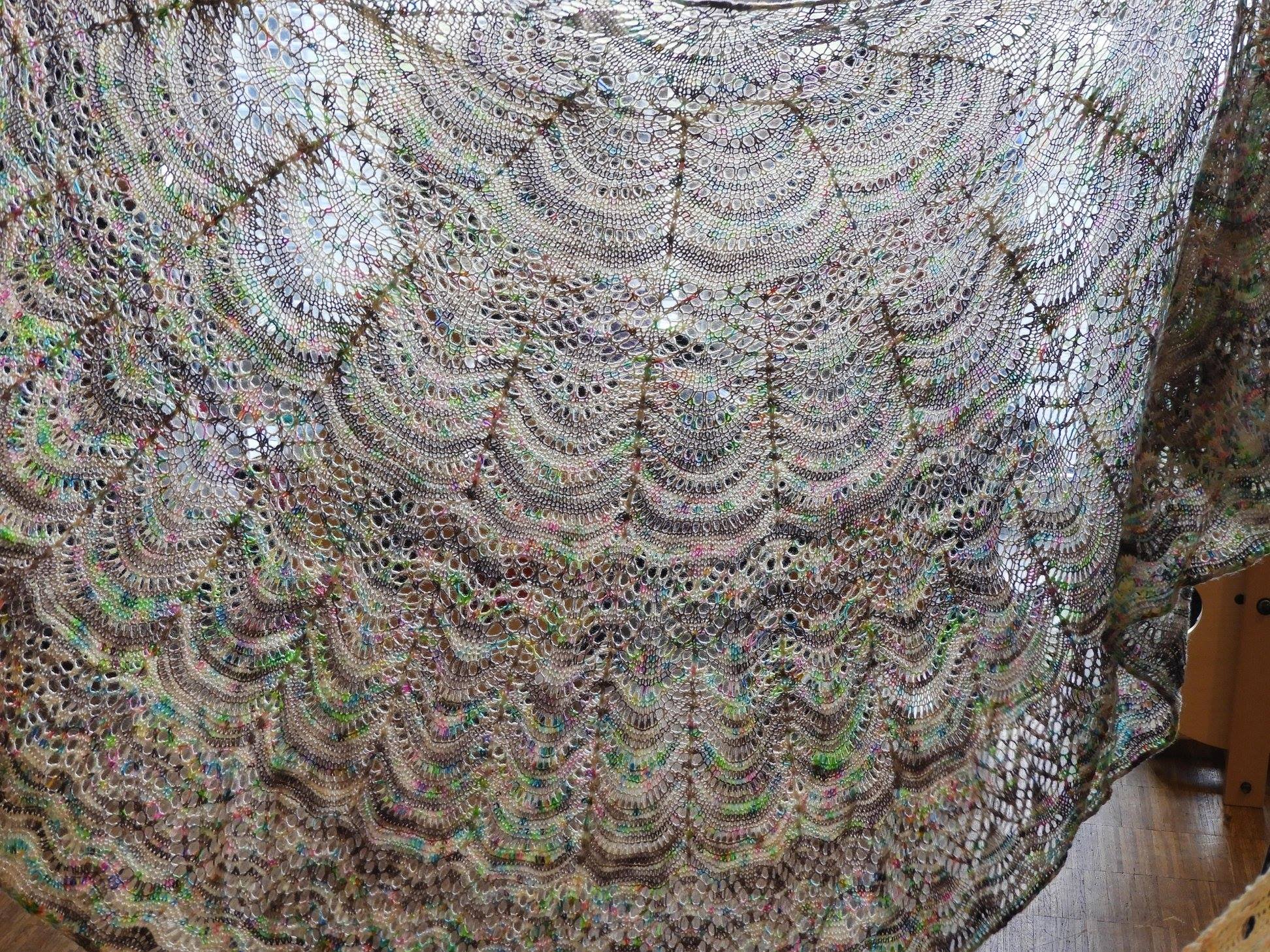 The Lise Shawl with light shining through