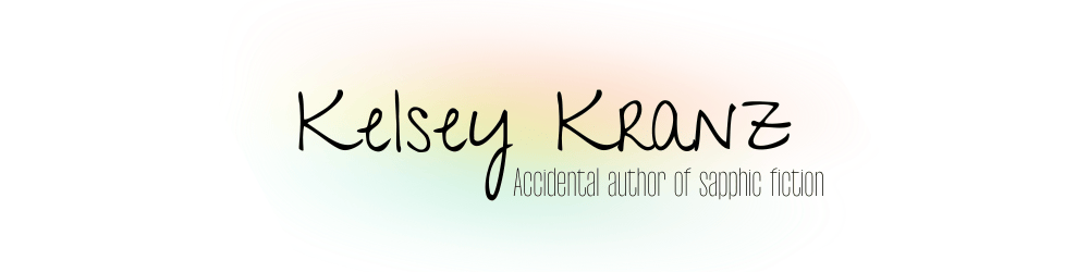 Logo Image - the words Kelsey Kranz in a handwritten-style font. Underneath, the words accidental author of sapphic fiction in a smaller, narrow font. All text is laid over a light rainbow gradient.