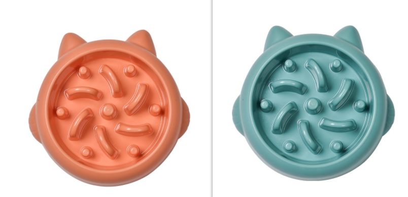 Slow Feeder Bowl in Orange bone shape maze pattern for dogs and cats on white background