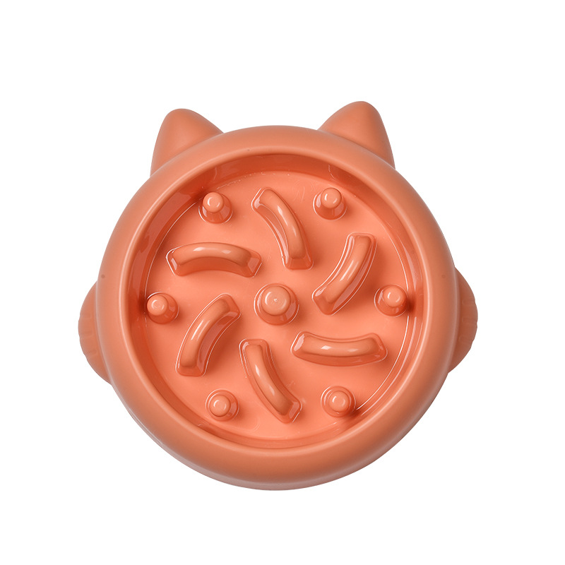 Slow Feeder Bowl in Orange bone shape maze pattern for dogs and cats on white background