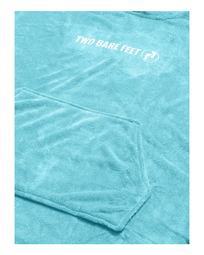 Close up of light blue towel poncho soft fabric