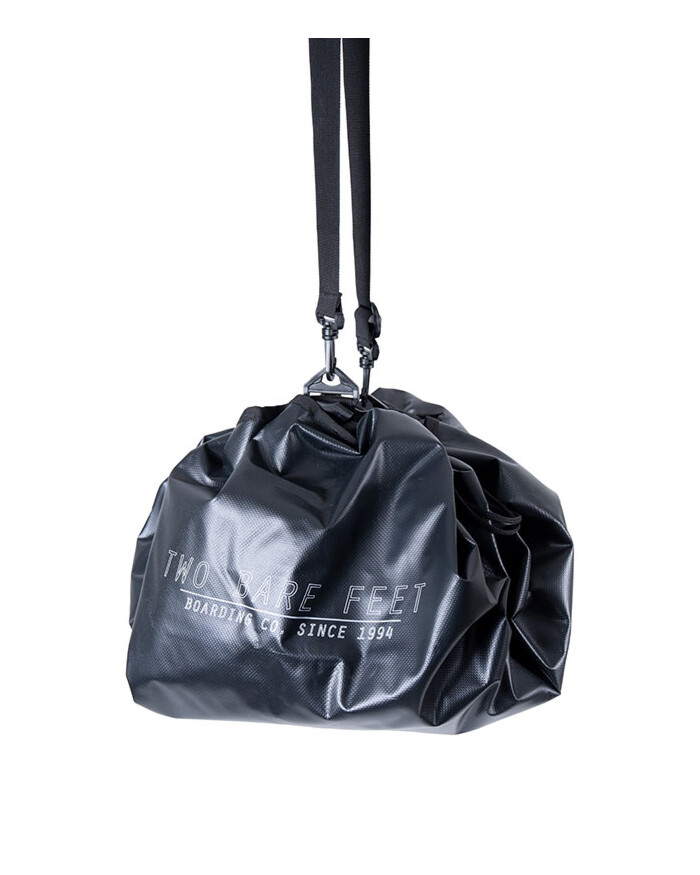Black changing as a bag with strap attachment
