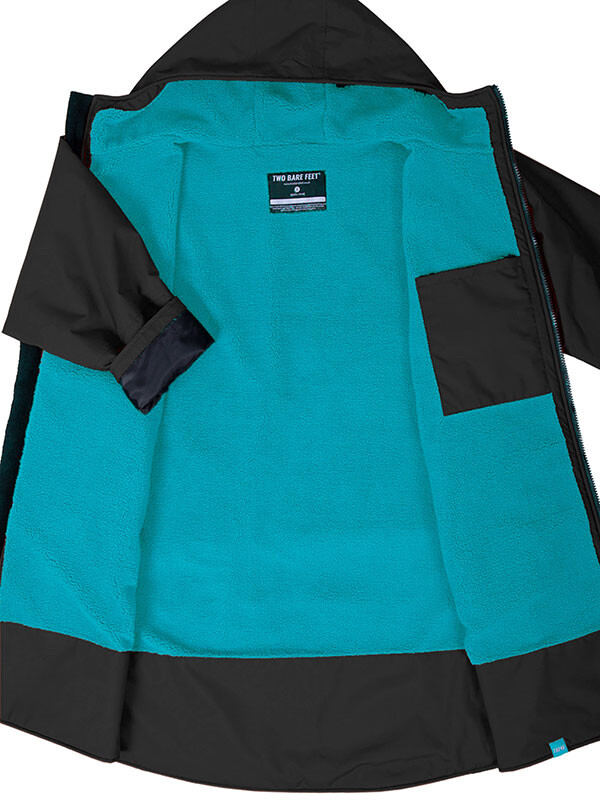 Inside of a weatherproof changing robe. Teal soft lining.