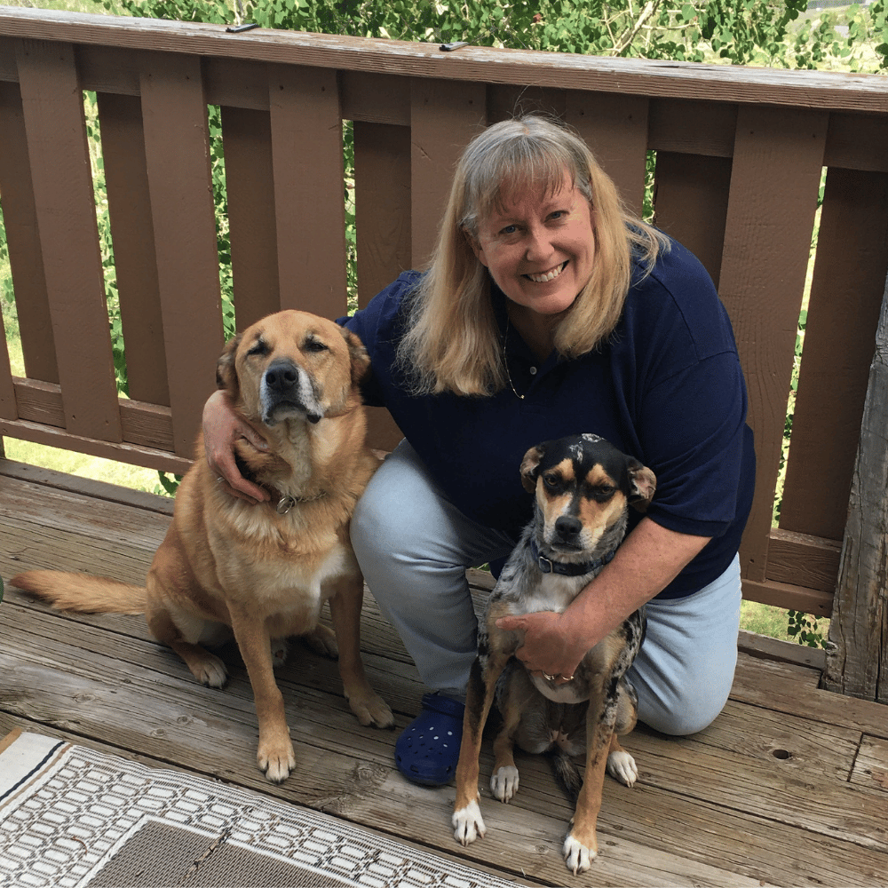 Educator, writer, and dog trainer with her two dogs, founder of Helper Path Studio, which creates meaningful family activities and adventures.