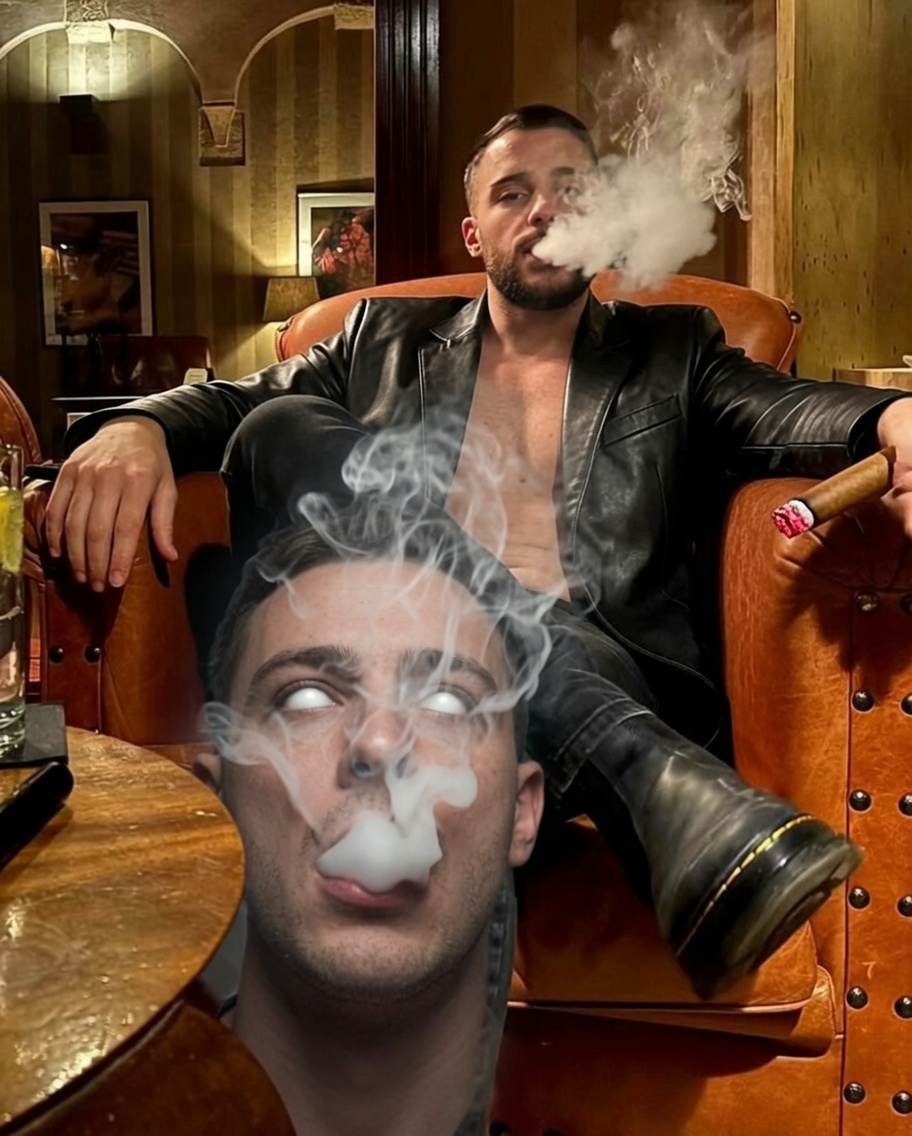 Hypnotized guy at feet of chauvinistic Master wearing black leather blazer shirtless with boots blowing smoke hypnosmoke