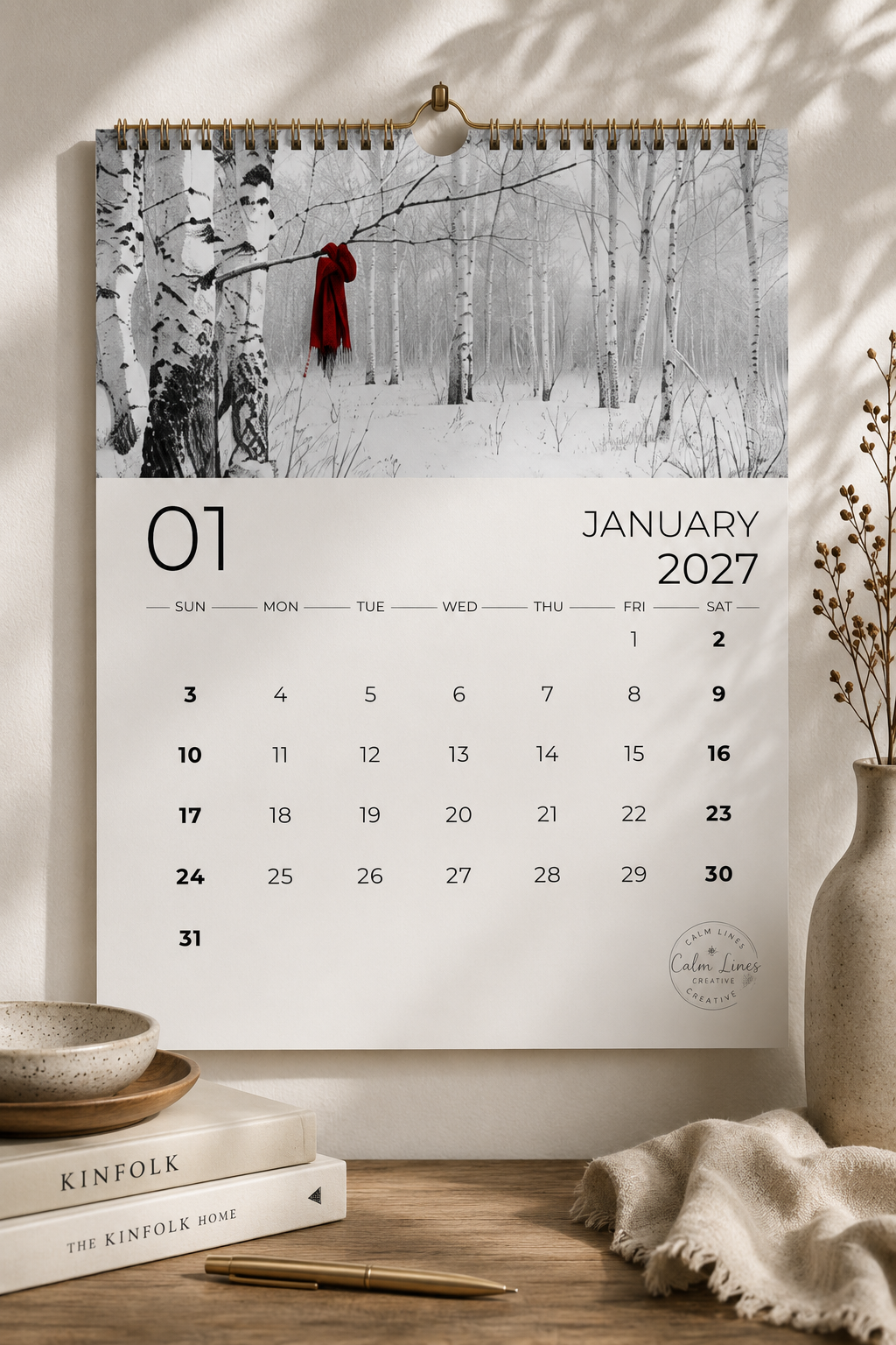 Minimalist wall mockup of the January 2027 printable black and white photography calendar.