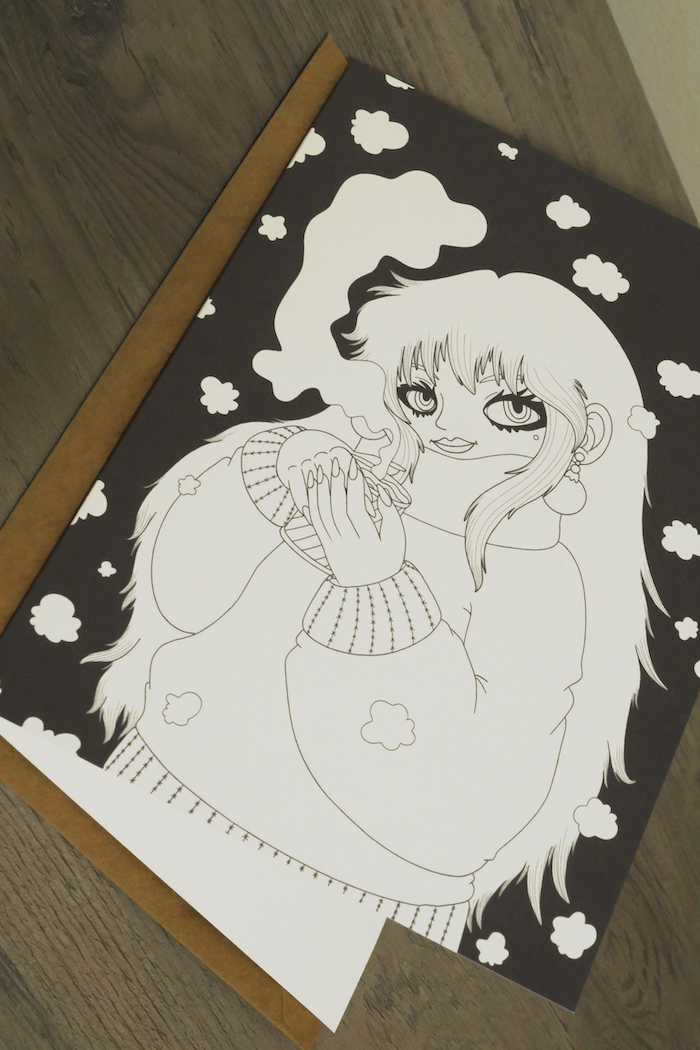 A printable greeting card by Veil of Entheos that features a woman drinking a cup of coffee. She is outside in the snow, wearing a winter outfit.