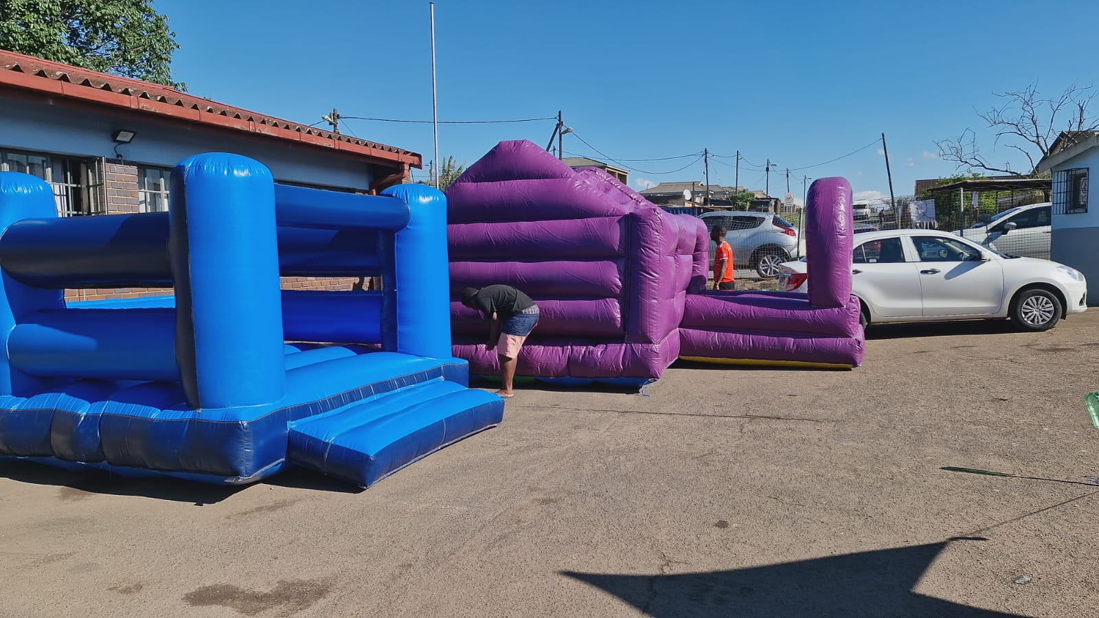Blue Jumping Castle 3m by 3m and Purple Jumping Castle which looks like a house, Durban Jumping Castle Hire
