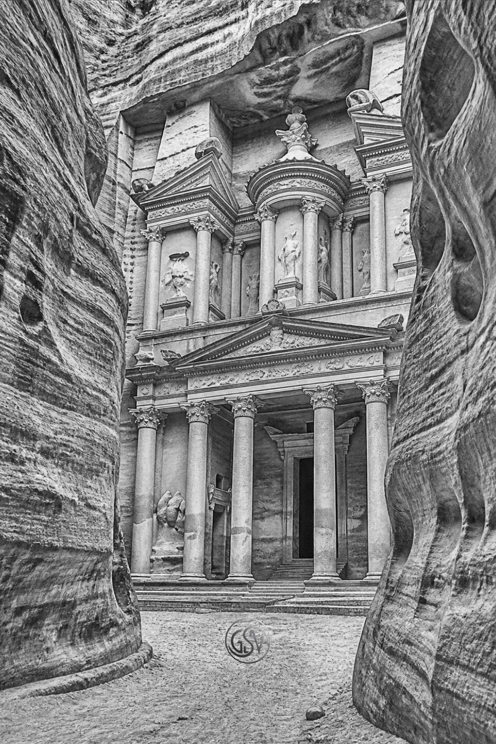 Grayscale coloring page of an ancient temple facade carved into  the sandstone cliffs of Petra