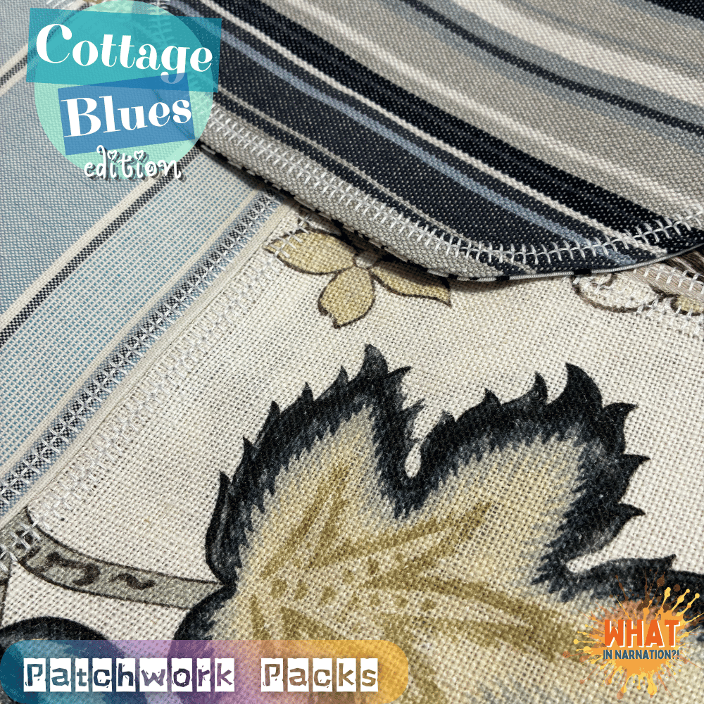 Close-up of the Cottage Blues handmade patchwork backpack showcasing textured patchwork, decorative stitching, and shades of blue created from rescued textiles. One-of-a-kind sustainable handmade backpack by What in Narnation.