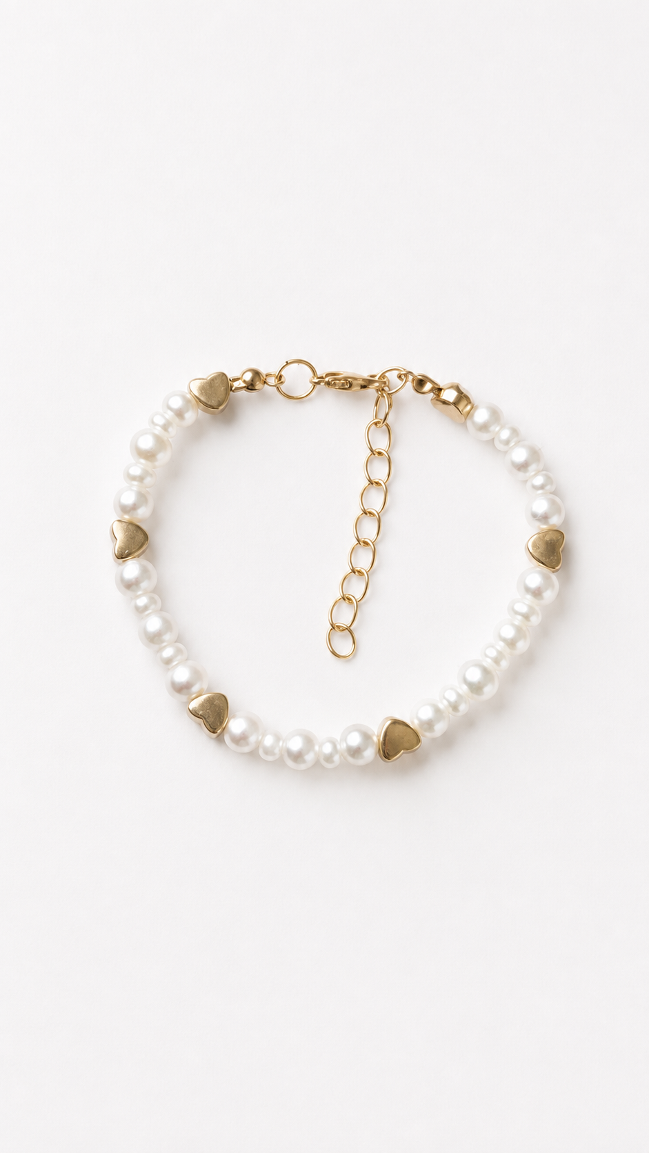 Handmade white pearl bracelet with gold heart beads, lobster clasp and adjustable extender chain