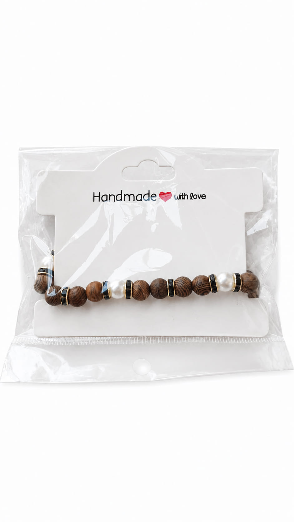 Dark wood and faux pearl bracelet presented on a Handmade with Love display card