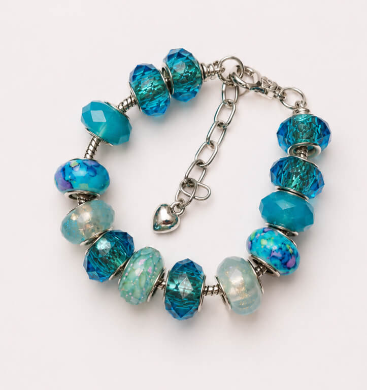 Handmade ocean blue European charm bracelet with aqua and iridescent beads