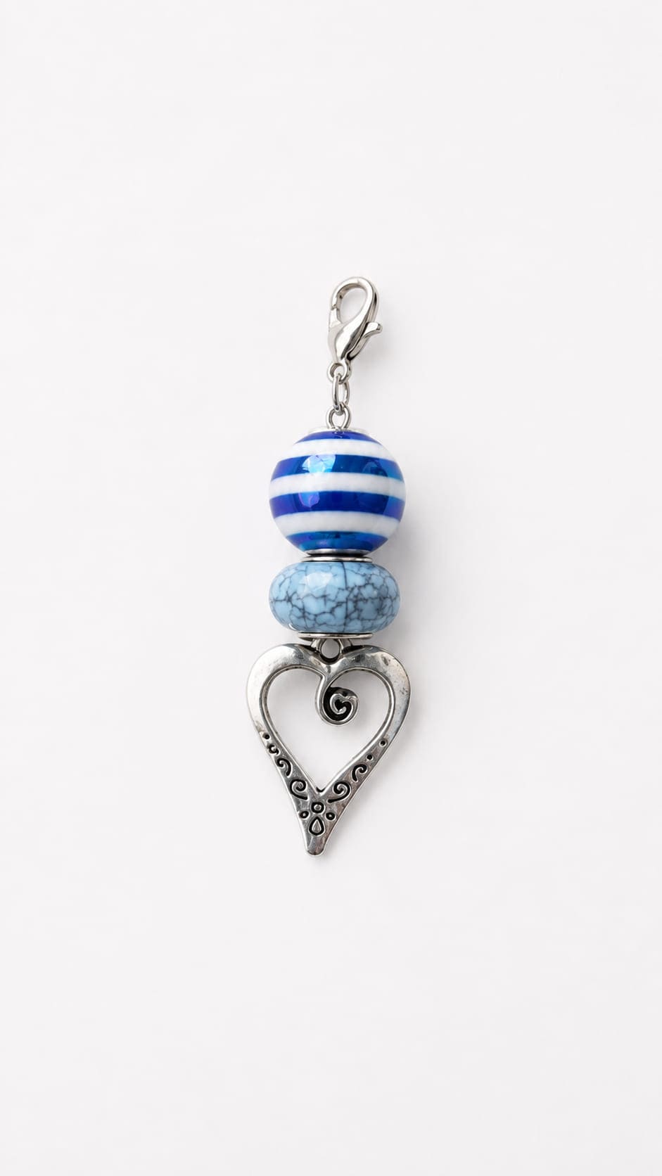 Handmade Something Blue bridal bouquet charm with a nautical blue and white striped bead, a turquoise marble rondelle bead, and an ornate silver heart charm.