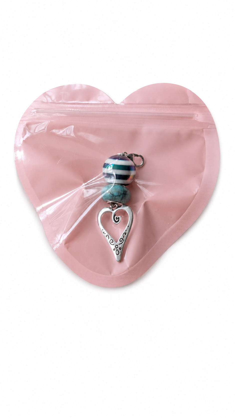 Something Blue handmade bridal heart charm safely presented inside a cute pink heart-shaped zip-lock gift packaging pouch.