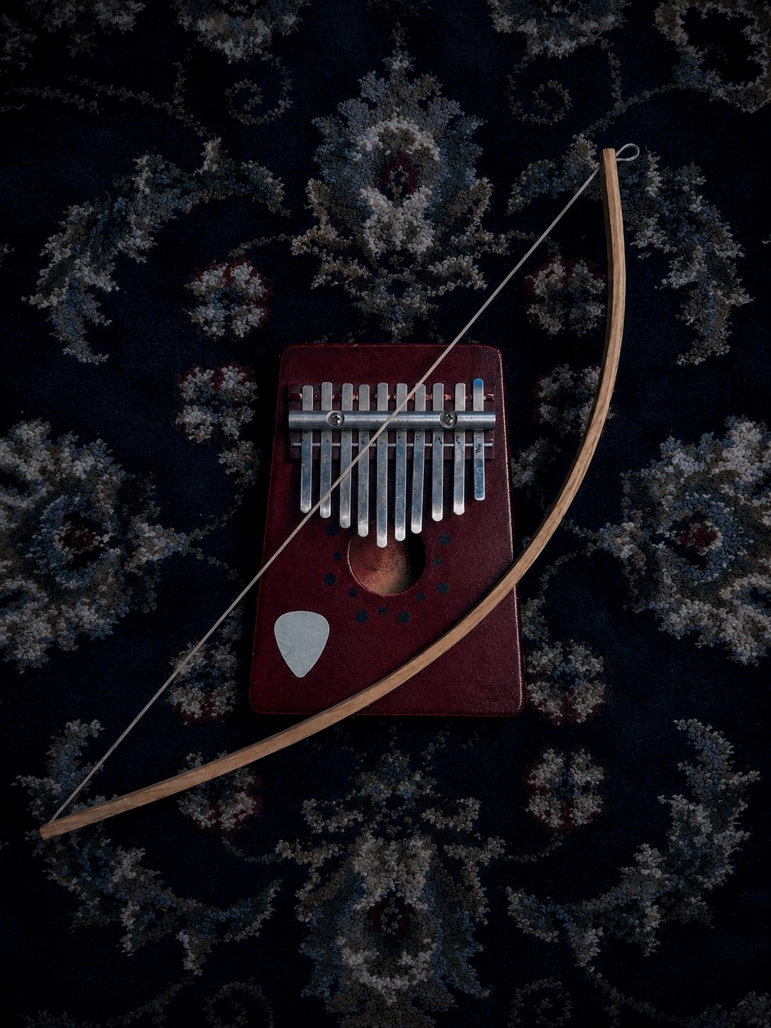 Dark cinematic kalimba library packed with haunting acoustic textures, eerie plucks, taps, bowed sounds and dissonant cues. High-quality stereo WAV recordings for composers, filmmakers, editors and game developers.