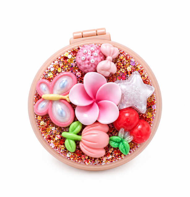 Hand-decorated pink resin compact brush mirror with cherries, flowers, butterfly, bow, star and glitter