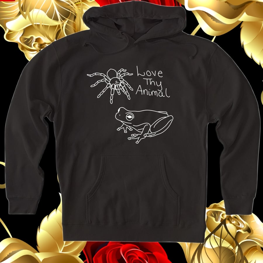 An image depicting a black sweater with a frog and spider graphic.