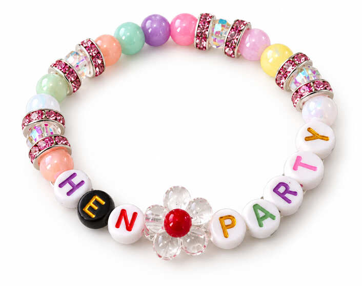 A glamorous Hen Party beaded bracelet showcasing pastel gumball beads, sparkling pink rhinestone spacer rings, and a clear acrylic flower charm with a red center.