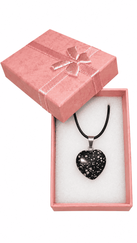 Genuine Snowflake Obsidian heart necklace presented in an open pink jewellery gift box with satin ribbon.