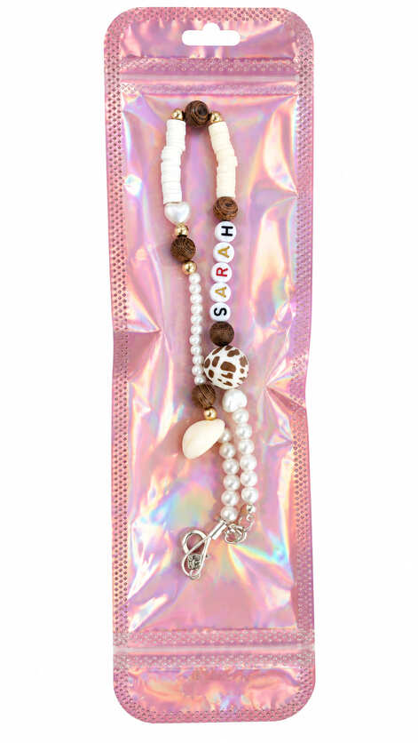Personalised beaded walking stick wrist loop with name beads presented in a holographic gift pouch