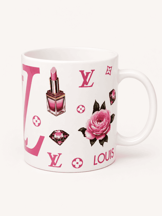 Side view of hand-printed white ceramic mug with pink floral, lipstick, perfume and fashion-inspired design