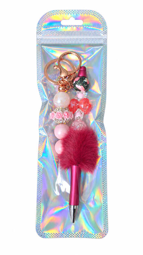 Rose pink and crimson beaded pen and keychain set packed inside a shimmering, metallic holographic resealable retail pouch.