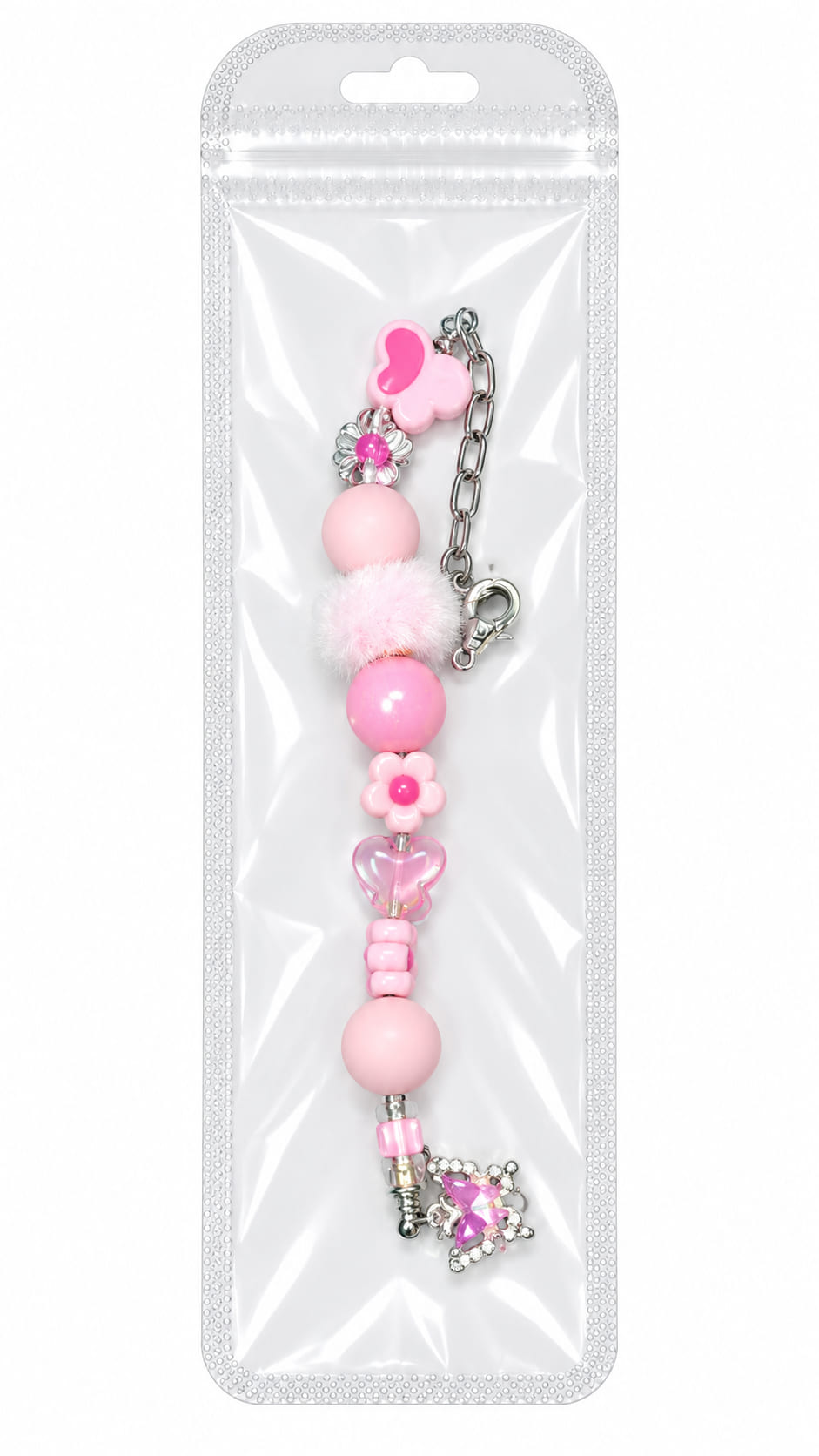 A pastel pink petal and heart silicone beaded fidget charm with a fuzzy pink pom-pom, displayed inside a clear, professional retail plastic pouch with a hanging tab.