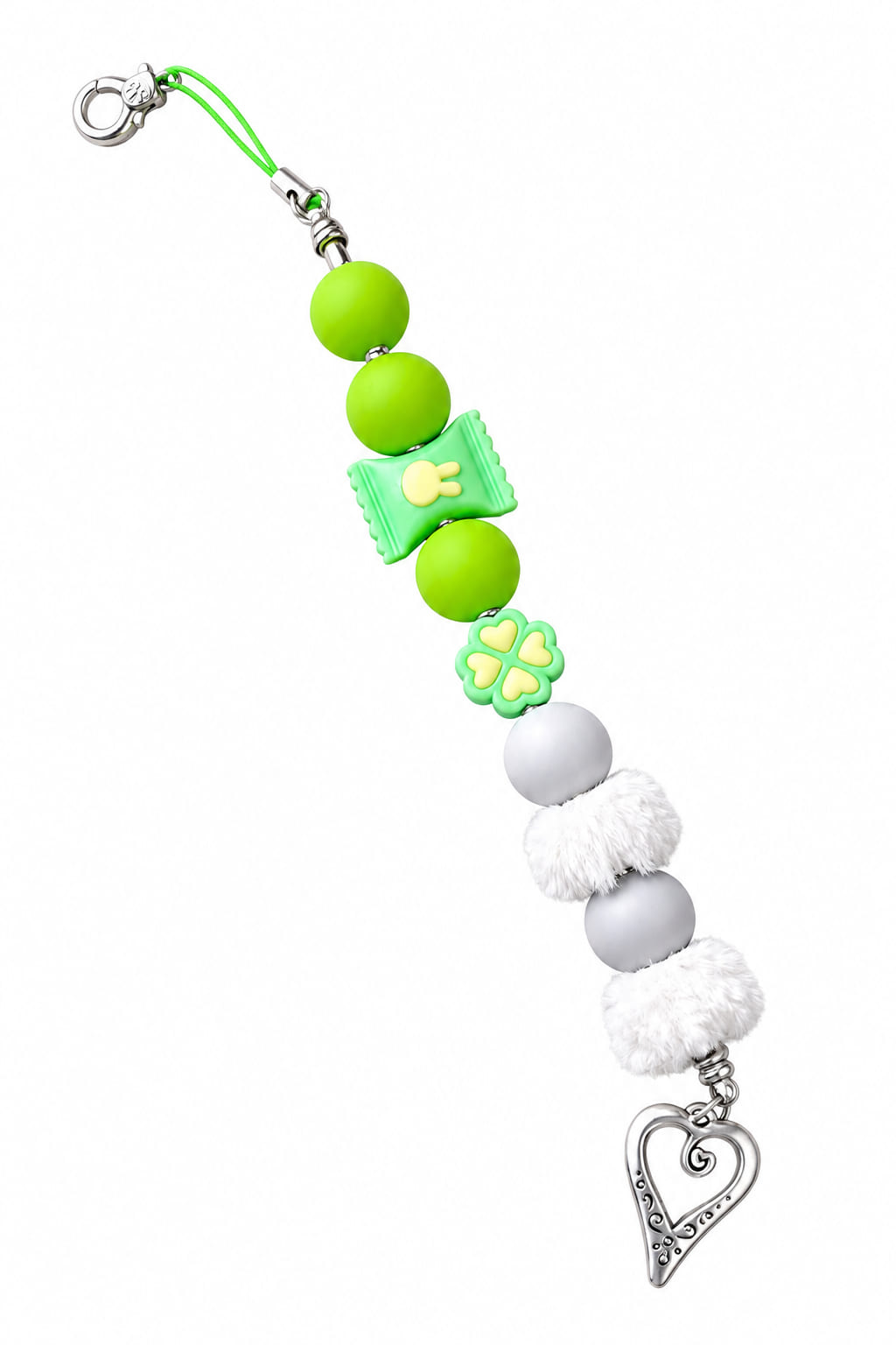 A close-up view of a novelty lucky garden-themed fidget strap showing a lime green loop cord, a silver lobster clasp, matte green silicone beads, a green wrapped candy bead with a bunny face, a green four-leaf clover flower, light grey spheres, two fluffy