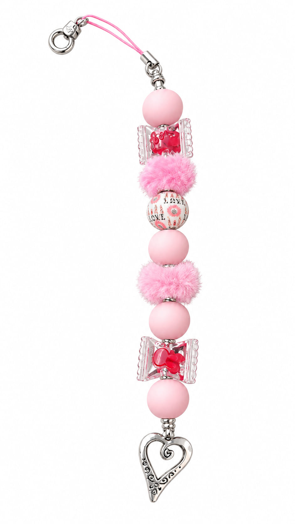A close-up view of a novelty romantic candy-themed fidget strap showing a pink loop cord, a silver lobster clasp, matte pink silicone beads, two clear wrapped candy spacers with red centers, a bead printed with the word LOVE, two fluffy pink pom-poms, and