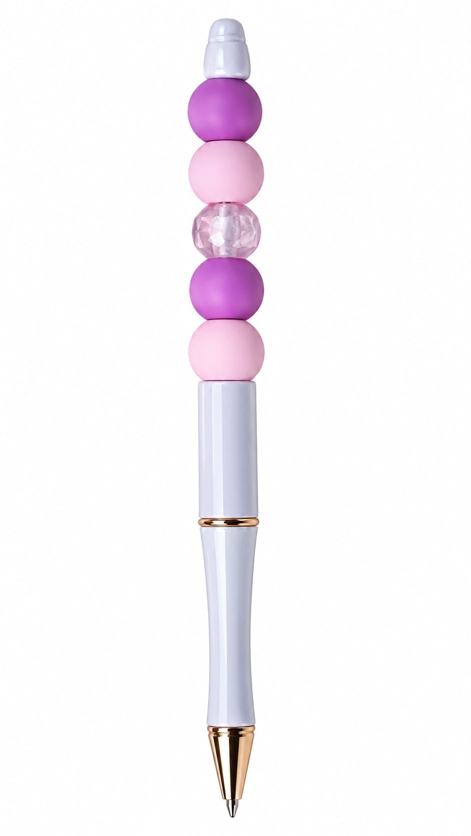 A close-up view of a custom pastel lilac ballpoint pen with high-shine gold accents, decorated with alternating matte pink and violet purple silicone beads and a translucent pink faceted crystal spacer.