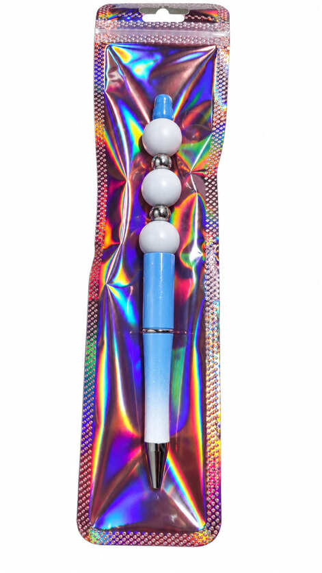 A custom blue and white ombre beaded pen with matte grey beads, displayed inside a long, shimmering, iridescent holographic retail pouch.