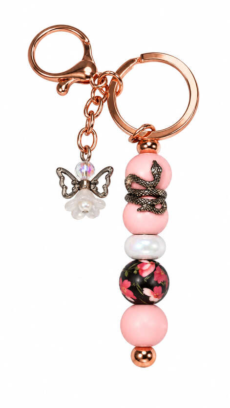 Handmade pink floral beaded keychain with coiled snake, angel charm and rose-gold-tone clasp